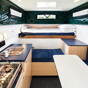 tm-bush-camper-4wd-2-berth-interior-bed