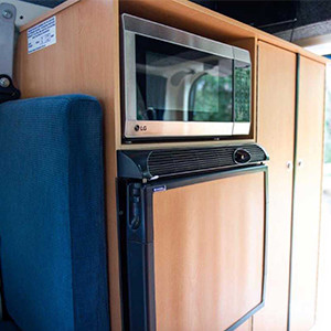 CP Standard Campervan – 4 Berth-inside-fride-and-microwave