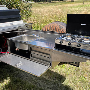 WA 200 Series 4WD with Roof Top Tent, POD & Camper Trailer – 5 Berth-cooking-area